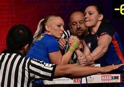 Image result for Man/Woman Arm Wrestling