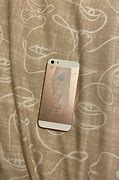 Image result for iPhone SE Rose Gold On Bed