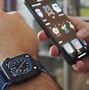 Image result for Someone Tapping iPhone to Apple Watch