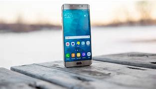 Image result for Samsung Foldind Cell Phone Metal Gold