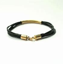 Image result for Expensive Leather and 14K Gold Bracelets
