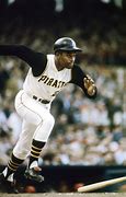 Image result for Roberto Clemente Hitiing Baseball