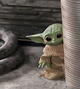 Image result for Baby Yoda Hiding