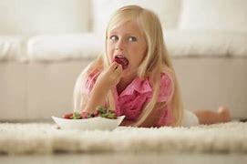 Image result for Little Girl Lying Eating