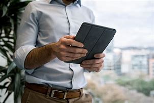 Image result for Man Holding iPad