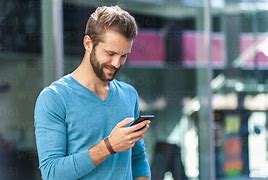 Image result for Young Man On Cell Phone
