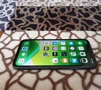 Image result for iPhone Space Grey with Apple Logo in Middle SE