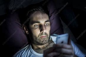 Image result for Person On Phone in Dark