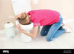 Image result for Vomit in a Toilit Bowl