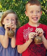 Image result for Fall Themed Caramel Apples