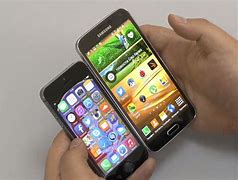 Image result for Galaxy S V vs iPhone 5S