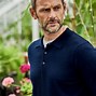 Image result for Lacoste Merino Wool Polo