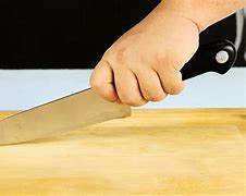 Image result for Holding Out a Knife