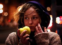 Image result for A Person Eating an Apple