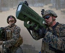 Image result for High-Tech Military Guns