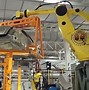 Image result for Tesla Factory Robot Arm