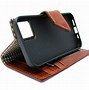Image result for iPhone 7 Plus Leather Wallet Case with Wrist Strap