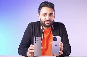 Image result for iPhone 14 Pro Max Black Person Holding It