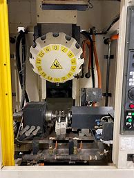 Image result for Fanuc Robot CNC Machine