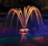 Image result for Floating Solar Powered Pool Fountains