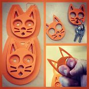 Image result for Cat Brass Knuckle Keychain