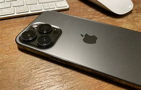 Image result for iPhone 13 Pro Max Graphite Hello Screen in Hand