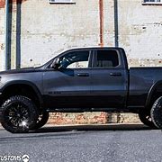 Image result for Black Ram 1500 Lifted