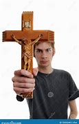 Image result for Man Holding Cross