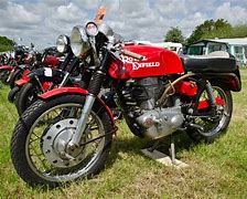 Image result for Royal Enfield Continental GT Double Exhoust