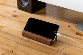 Image result for iPhone On Wooden Table