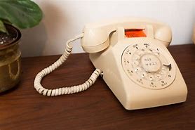 Image result for 1960s Rotary Wireless Phone in a Bag