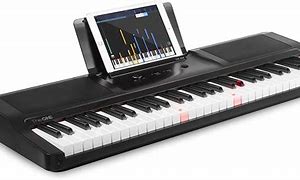 Image result for Kids White Piano Keyboard with Light Up Keys 90s