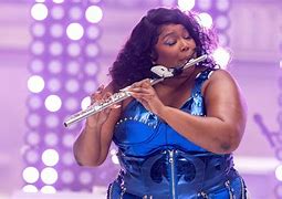 Image result for Lizzo Plays Flute at Concert