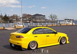 Image result for Teal Car with Yellow Tint