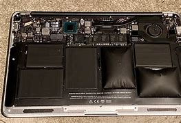 Image result for Signs of Laptop Battery Expanding