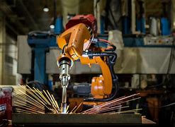 Image result for robot welder machine