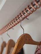 Image result for Wall Mounted Sloped Clothes Rail