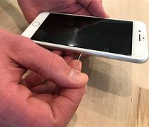 Image result for Sim Card Hole On iPhone SE