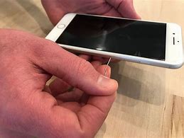 Image result for How to Take Sim Card Out of iPhone
