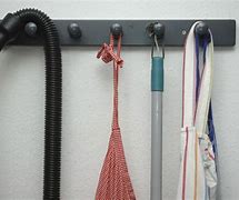 Image result for Vacuum Clips for Wall