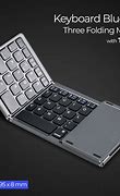 Image result for iTel V5.1 with Folding Bluetooth Keyboard