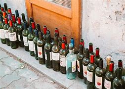 Image result for Pile of Wine Bottles