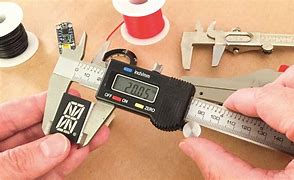 Image result for Scientist Measuring Objects