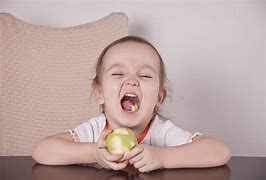 Image result for Girl Eating Green Apple