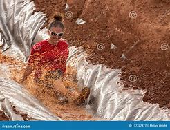 Image result for Woman Mud Sliding