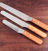 Image result for Silicone Utensil for Loosens Cake around Edge Knife