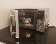 Image result for Metal Foil Inside Microwave Oven