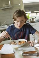 Image result for A Boy Eating Breakfast