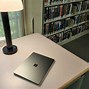 Image result for Microsoft Surface Laptop On a Table