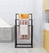 Image result for Foldable Standing Towel Rack Black